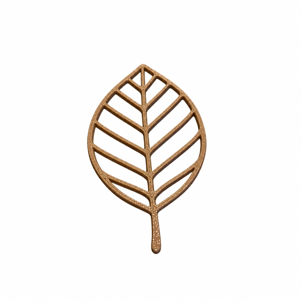 3D printed brown simple leaf decor piece on a white background