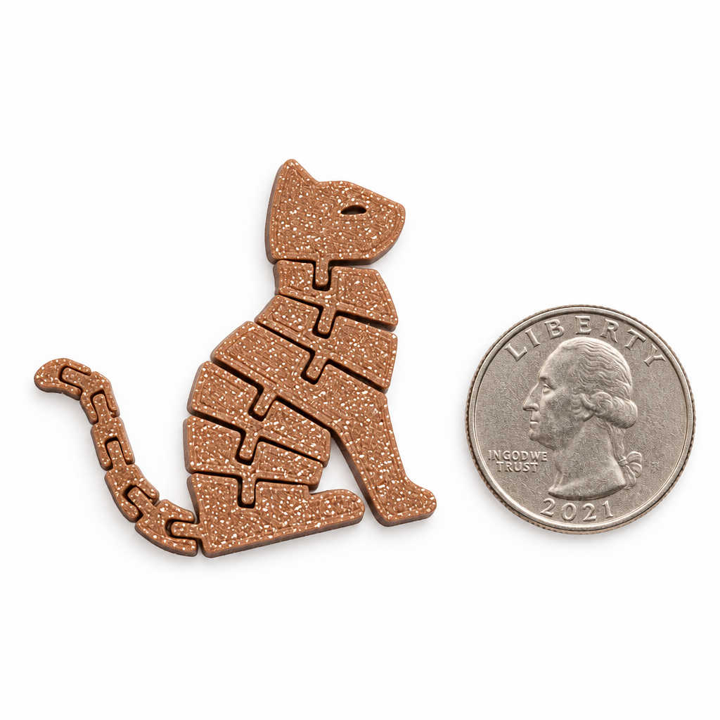 Keychain next to a coin for size