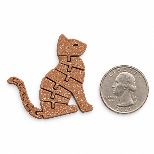 Keychain next to a coin for size