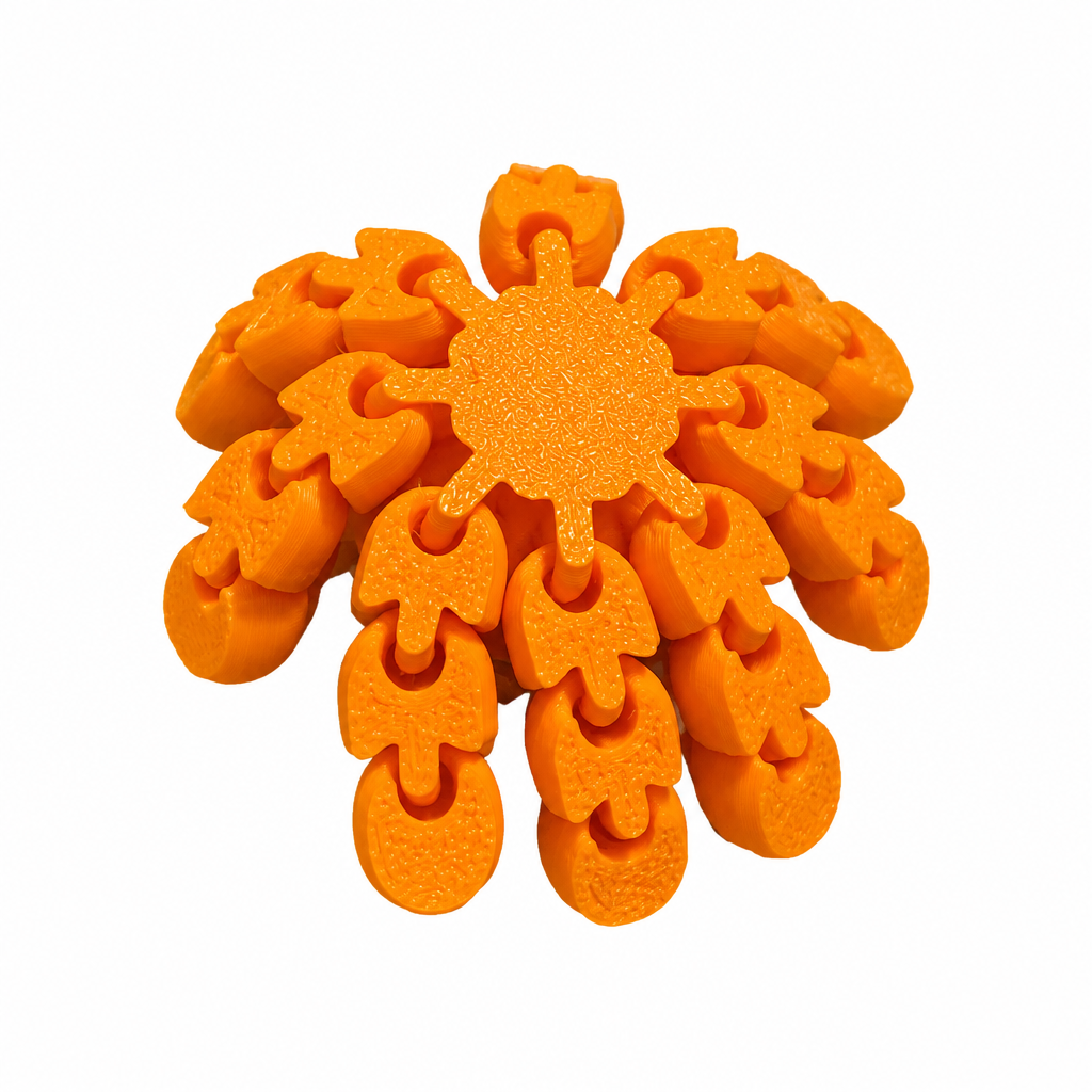 3D printed orange octopus keychain close up on white background