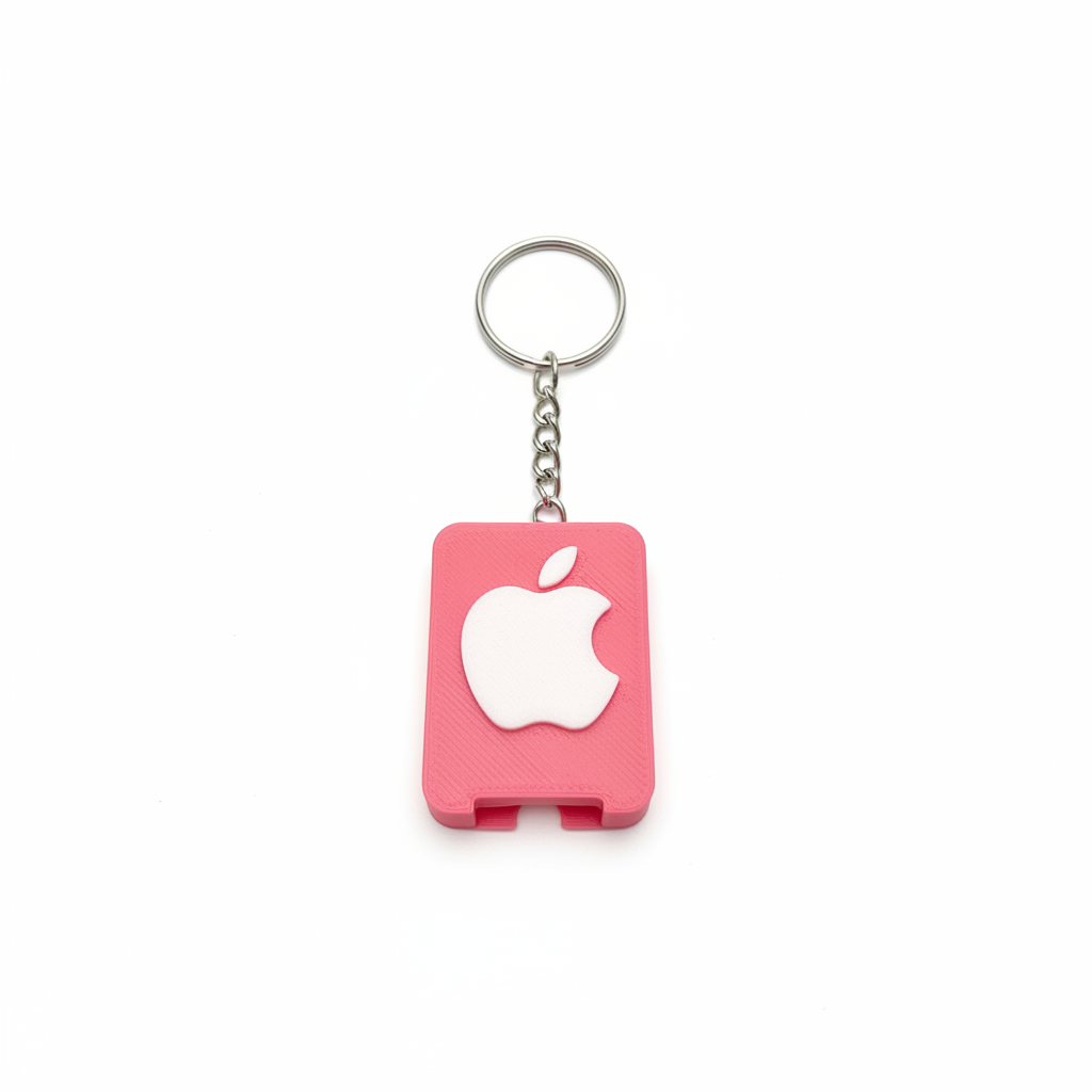 Pink 3D printed bottle opener keychain with bitten fruit logo on white background